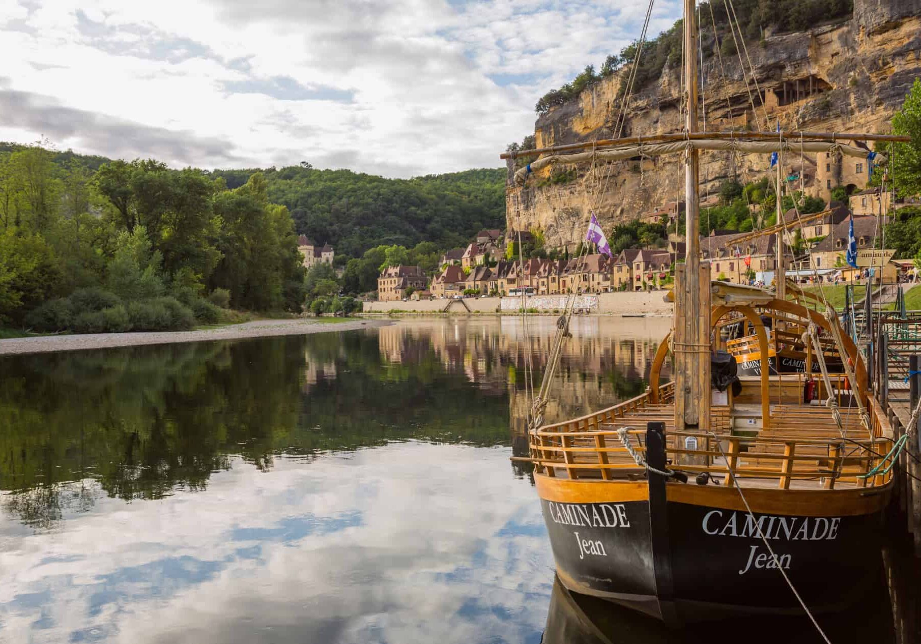 La Roque-Gageac, Dordogne, France - August 13, 2019: Canoeing on the river Dordogne at La Roque-Gageac. France